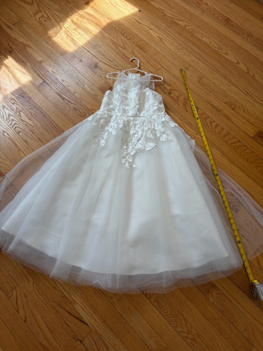 Elegant White Child’s Dress with Floral Details